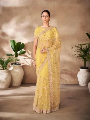 Yellow Net base embroidered and zarkan work saree